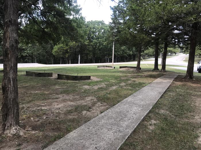 A photo of Horseshoe pits next to group shelter at WHEATLAND PARK