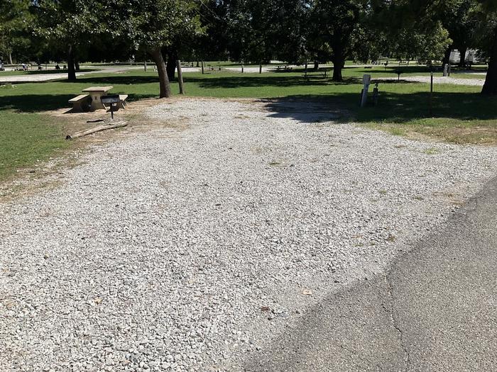 A photo of Site 11 of Loop Hitching Post at Walnut Creek  with Picnic Table, Electricity Hookup, Fire Pit, Shade, Water Hookup