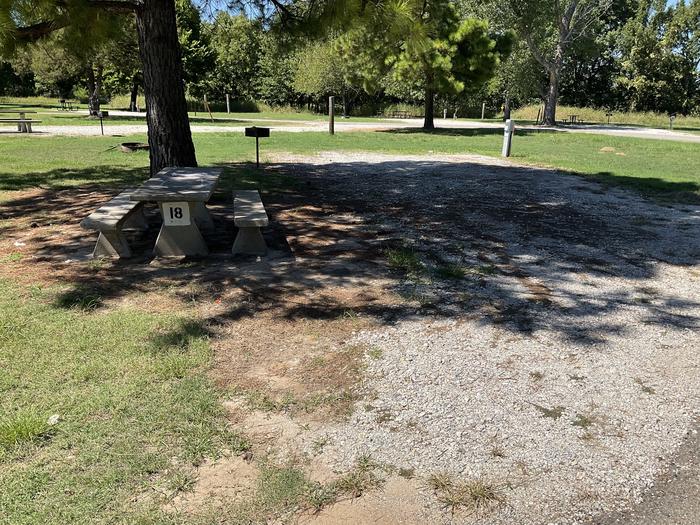 A photo of Site 18 of Loop Hitching Post at Walnut Creek  with Picnic Table, Electricity Hookup, Fire Pit, Shade, Water Hookup