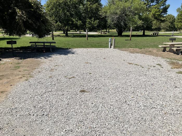A photo of Site 21 of Loop Hitching Post at Walnut Creek  with Picnic Table, Electricity Hookup, Fire Pit, Shade, Water Hookup