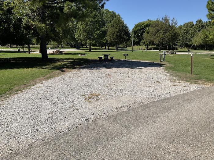 A photo of Site 19 of Loop Hitching Post at Walnut Creek  with Picnic Table, Electricity Hookup, Fire Pit, Shade, Water Hookup