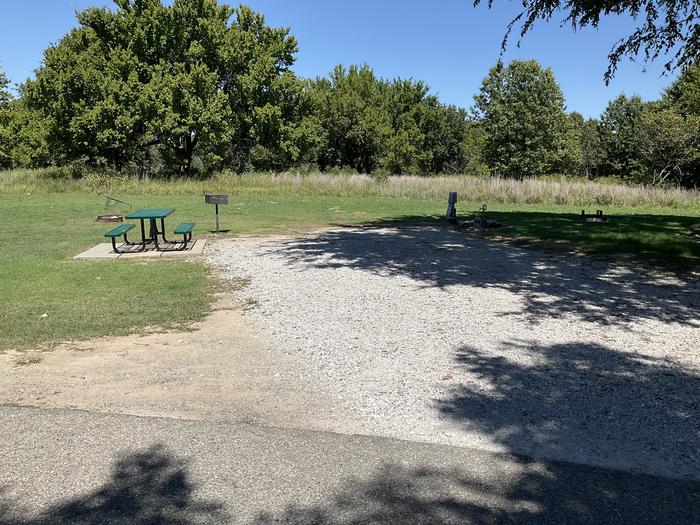 A photo of Site 30 of Loop Hitching Post at Walnut Creek  with Picnic Table, Electricity Hookup, Fire Pit, Shade, Water Hookup