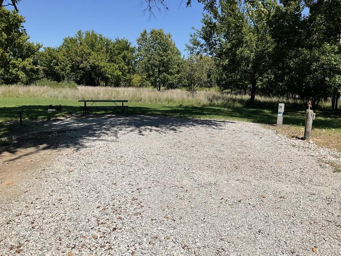 A photo of Site 31 of Loop Hitching Post at Walnut Creek  with Picnic Table, Electricity Hookup, Fire Pit, Shade, Water Hookup