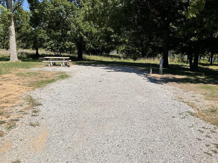 A photo of Site 32 of Loop Hitching Post at Walnut Creek  with Picnic Table, Electricity Hookup, Fire Pit, Shade, Water Hookup