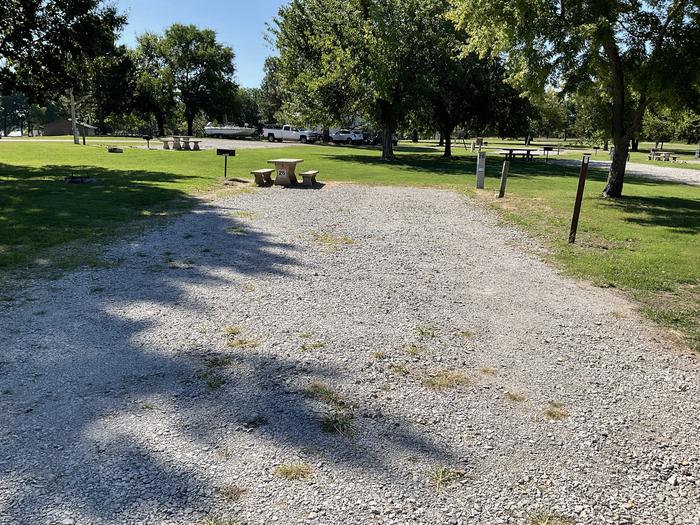 A photo of Site 26 of Loop Hitching Post at Walnut Creek  with Picnic Table, Electricity Hookup, Fire Pit, Shade, Water Hookup