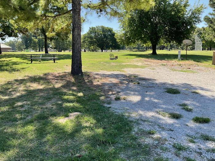 A photo of Site 40 of Loop Hitching Post at Walnut Creek  with Picnic Table, Electricity Hookup, Fire Pit, Shade, Water Hookup