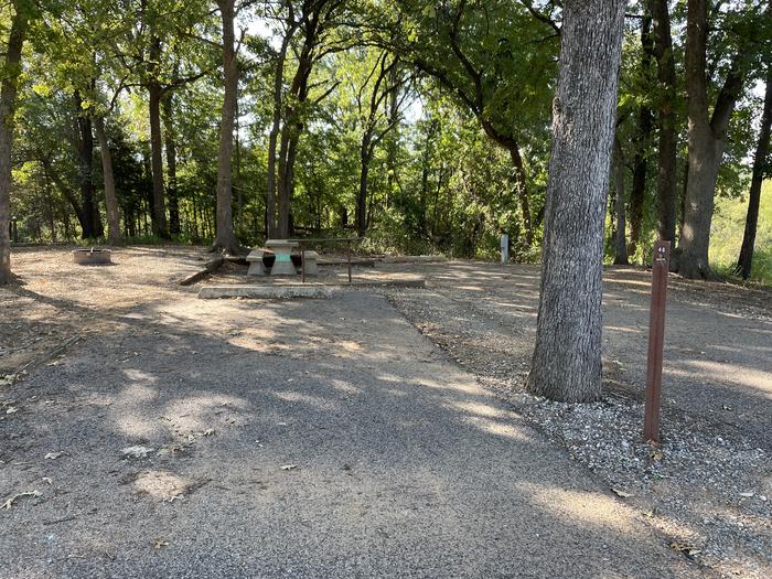 A photo of Site 48 of Loop JCRE at JOHNSON CREEK with Picnic Table, Electricity Hookup, Fire Pit, Shade, Water Hookup