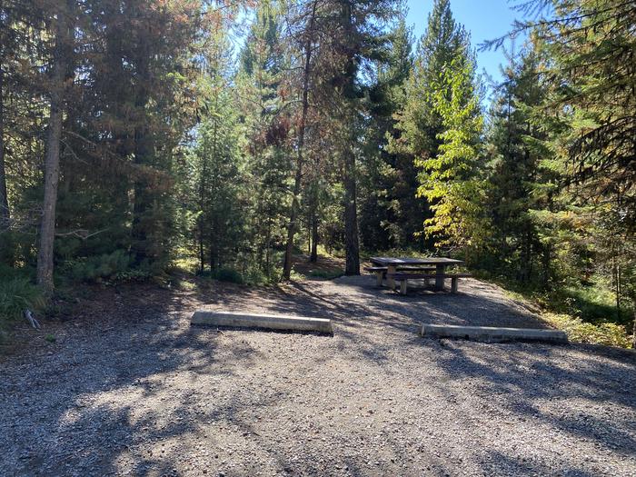 A photo of Site 20 of Loop EMERY BAY CAMPGROUND at EMERY BAY CAMPGROUND with Picnic Table, Fire Pit, Shade, Food Storage, Tent Pad