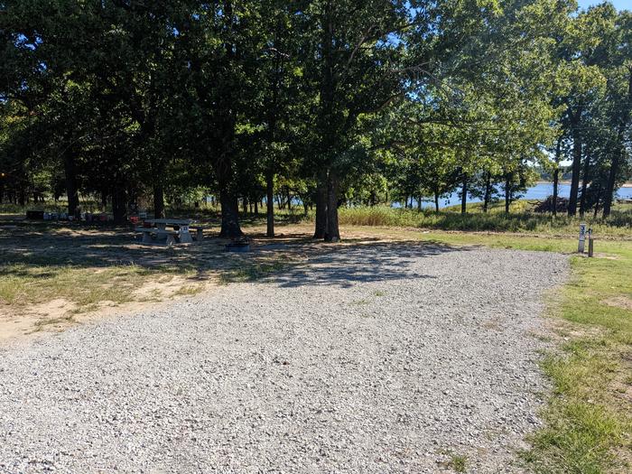 A photo of Site 33 of Loop Hitching Post at Walnut Creek  with Picnic Table, Electricity Hookup, Fire Pit, Shade
