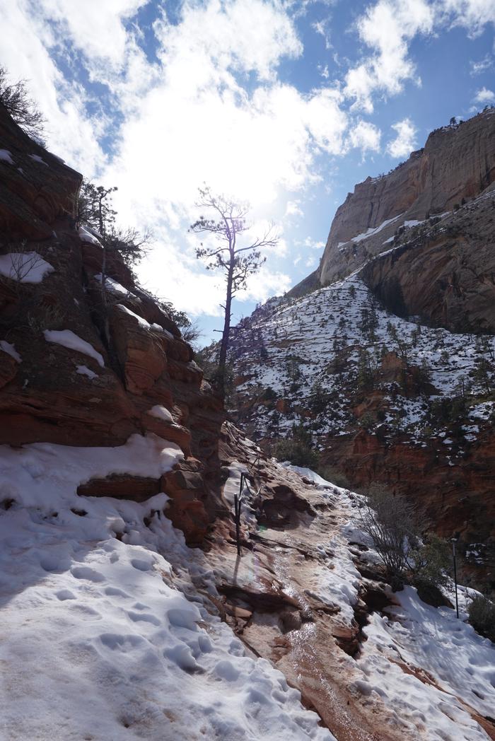 The start of Angels Landing trail with ice and snowWinter conditions along Angels Landing Trail