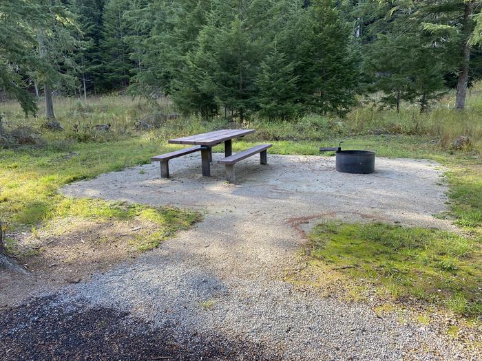 A photo of Site A001 of Loop A at KIT PRICE with Picnic Table, Fire Pit, Shade, Tent Pad