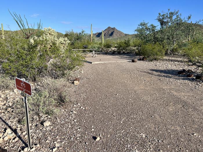 The driveway entrance into the campsite with a sign in front.Each campsite is marked by a placard to easily identify which site it is.