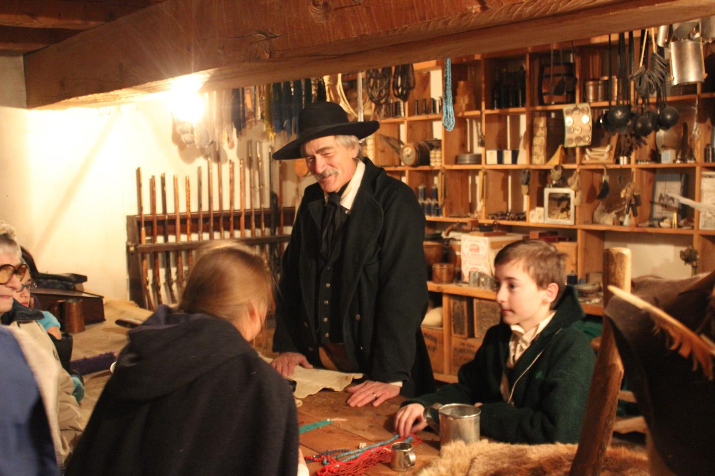Clerk bartering in Trade Room of Bent's Old Fort