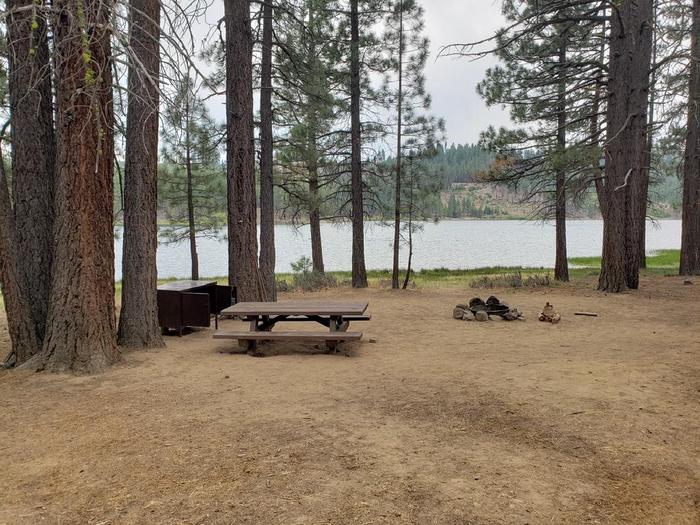 Spacious site featuring a picnic table, fire ring and bear box directly at the lake shore with clear water access.Long Point Site 37