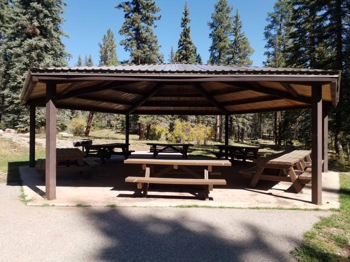 The ramada provides shade for groups along with picnic tables and a large grillClear Creek Group Campground ramada