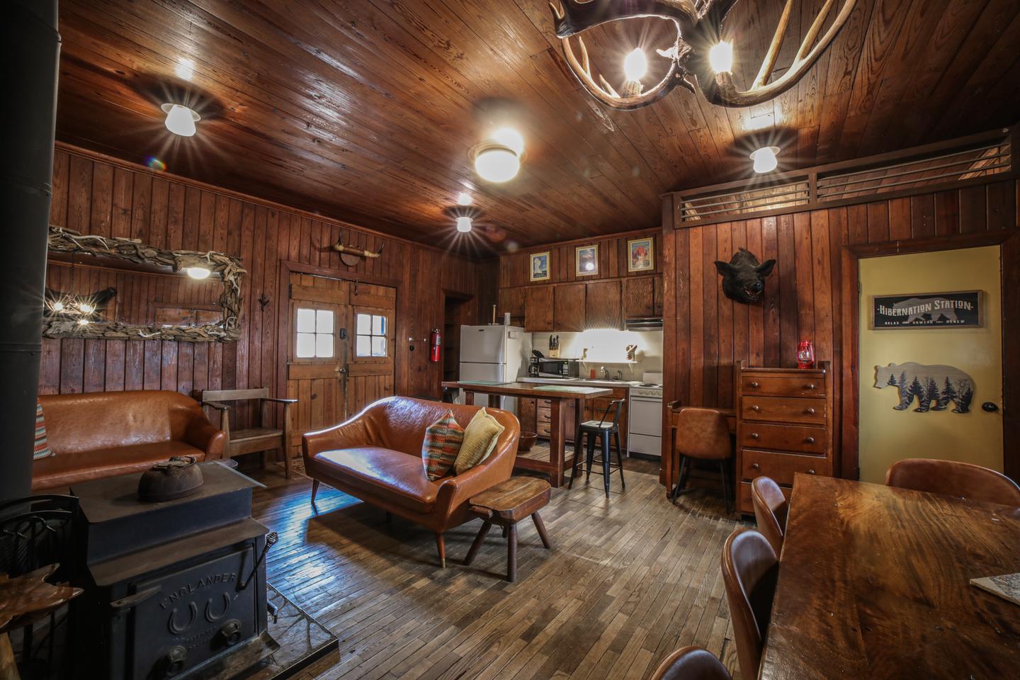 White Rock Mountain, Lodge kitchen.The open concept Lodge kitchen features new appliances, including an electric stove, refrigerator, microwave, toaster, coffee pot, crock pot, cooking utensils, pots & pans, vintage dishes, and much more!