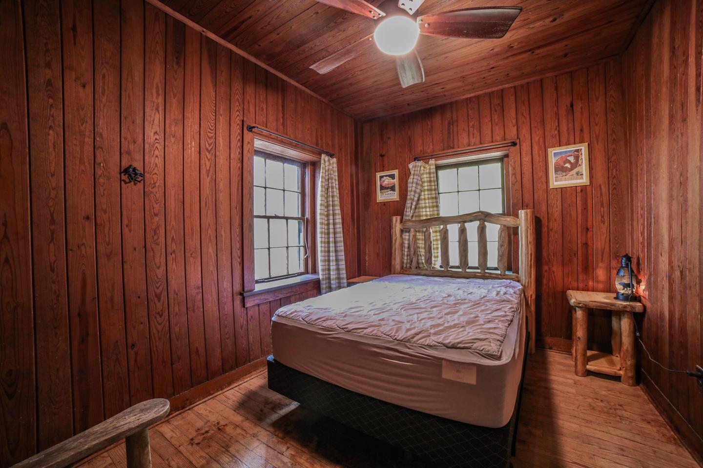 White Rock Mountain, Lodge Bedroom 1Bedroom 1 currently has one Queen sized bed. Attached is one 1/2 bath and one shower room with two showers.
