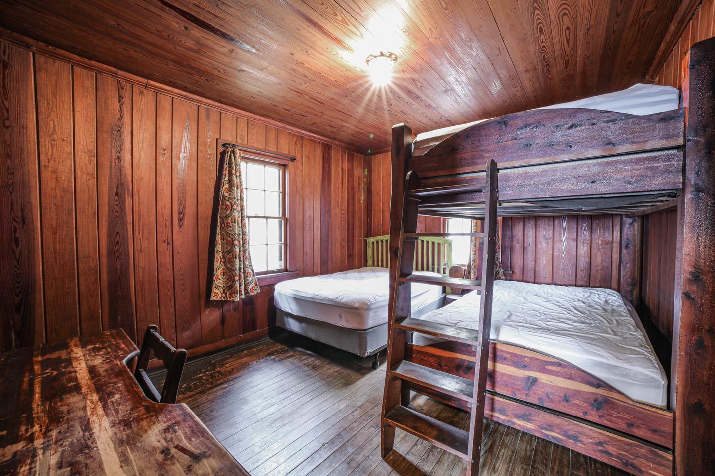 White Rock Mountain, Cabin B Bedroom.Cabin B bedroom has one full sized bed and one massive full sized bunkbed, new premium mattresses, clean mattress covers, electric stove when needed.