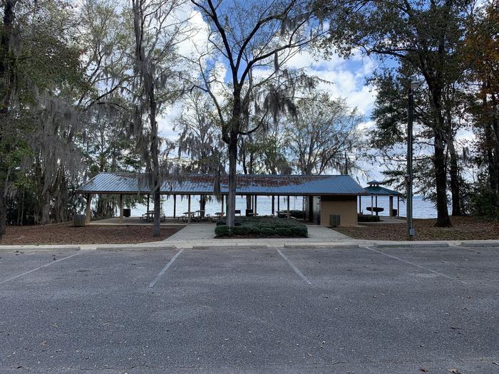 A photo of facility Highland Park with Picnic Table, Electricity Hookup, Fire Pit, Shade, Waterfront