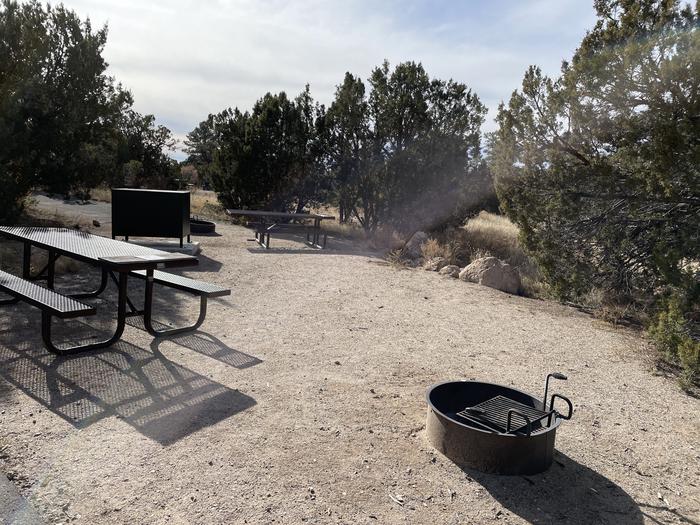 A photo of Site 20 of Loop Black Bear at JUNIPER CAMPGROUND with Picnic Table, Fire Pit, Site 19 in backgroundA photo of Site 20 of Loop Black Bear at JUNIPER CAMPGROUND with Picnic Table, Fire Pit, Site 19 in background. Site 20 and Site 19 are directly next to each other. Each site has own amenities.