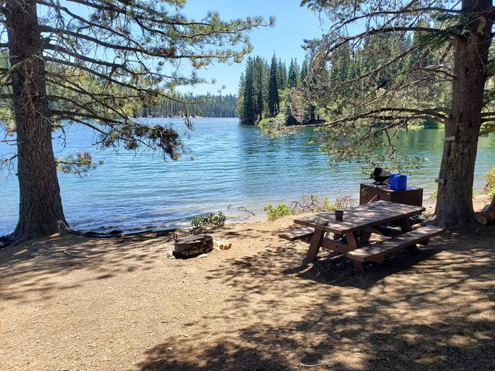 Beautiful waterfront site featuring a spectacular view, picnic table, fire ring, and bear box.Mill Creek Site 2