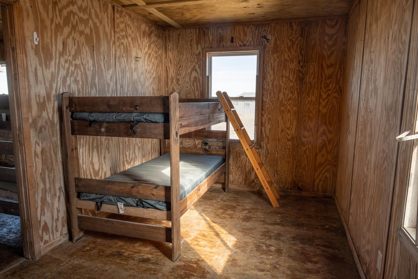 A view of the bedroom, with one bunk bed along the wallBedroom area.