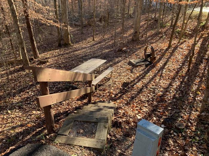 Stairs leading to the picnic table and circle fire ring.C-20 picnic table and fire ring are on another level than the camping pad.