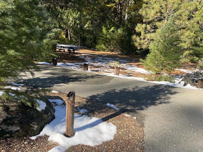 Spacious site featuring a picnic table, fire ring, bear box, and a paved driveway.Spanish Creek Site 4