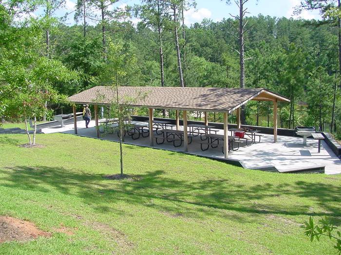 7 available picnic tables, 2 grills and accessible to the pet friendly beach.Elijah Cove Shelter