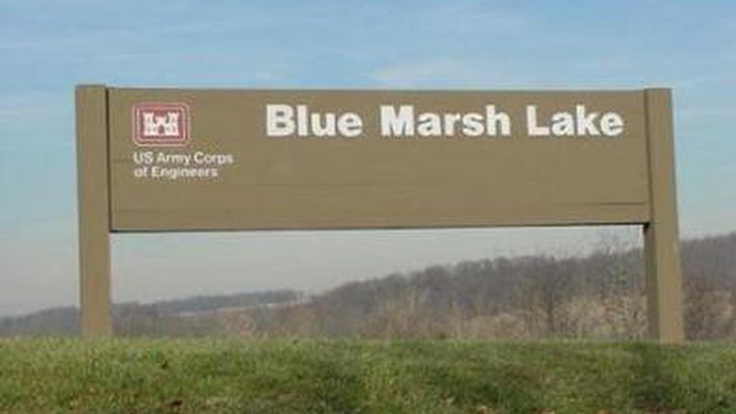Wooden brown sign with the red castle US Army Corps of Engineers logo and Blue Marsh Lake written on the sign.Blue Marsh Lake (Dry Brooks Day Use Area)