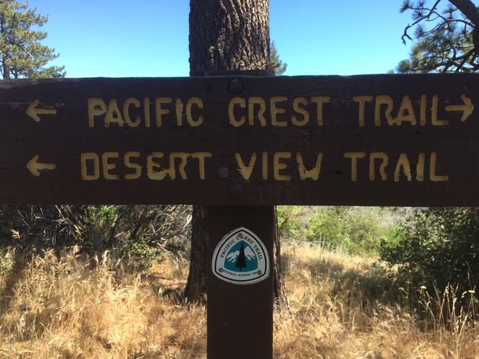 Wooden sign that has directions for the Pacific Crest Trail and Desert View TrailPCT sign on Mount Laguna