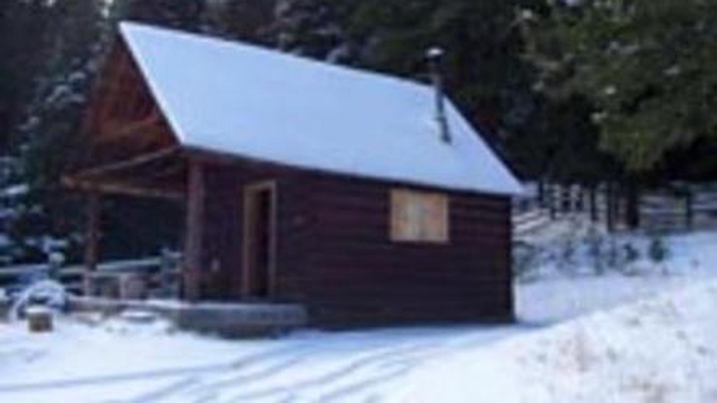 View of Indian Flats Cabin during the winter with snow on the groundIndian Flats Cabin