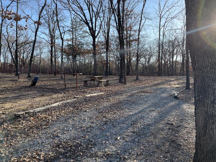 A photo of Site A12 of Loop A at PLATTER FLATS with Picnic Table, Electricity Hookup, Fire Pit, Shade, Water Hookup