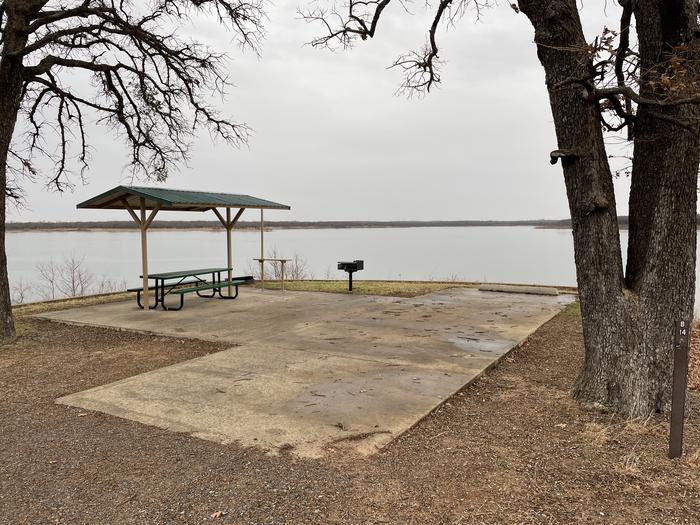 A photo of Site B14 of Loop B at PLATTER FLATS with Picnic Table, Electricity Hookup, Fire Pit, Waterfront, Water Hookup