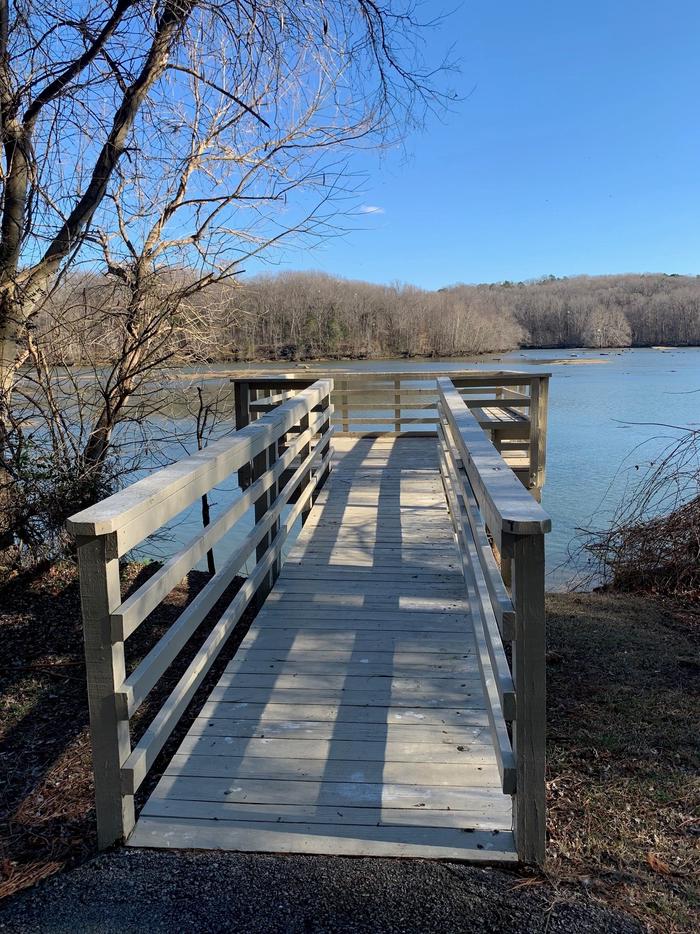 Accessible fishing pierWelcome to Tailrace Park! This is the handicap accessible fishing pier located below the shelter. Come press your luck on trying to catch the new world record blue catfish!