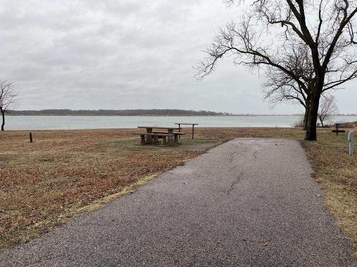A photo of Site D13 of Loop D at LAKESIDE (OK) with Picnic Table, Electricity Hookup, Fire Pit, Waterfront, Water Hookup
