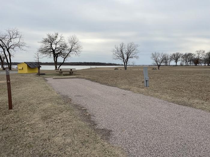 A photo of Site E25 of Loop E at LAKESIDE (OK) with Picnic Table, Electricity Hookup, Fire Pit, Waterfront, Water Hookup
