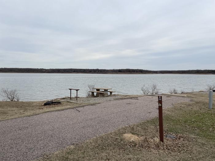 A photo of Site E26 of Loop E at LAKESIDE (OK) with Picnic Table, Electricity Hookup, Fire Pit, Waterfront, Water Hookup