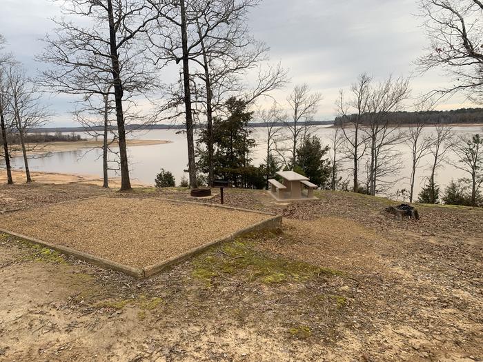 A photo of Site 9 of Loop Main Loop at Long Branch Campground with Picnic Table, Fire Pit, Tent Pad, Waterfront