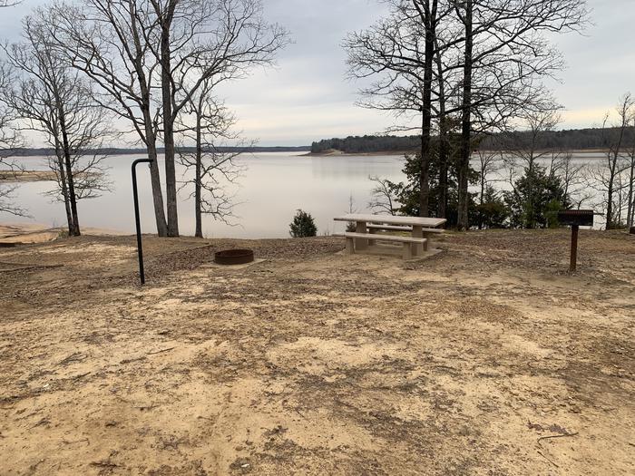 A photo of Site 10 of Loop Main Loop at Long Branch Campground with Picnic Table, Fire Pit, Tent Pad, Waterfront, Lantern Pole