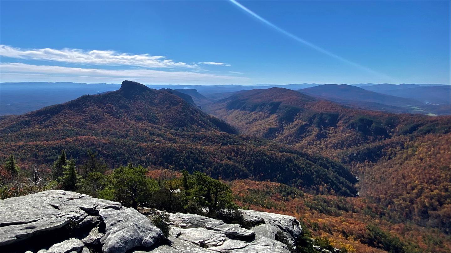 Rocky surface with mountain view. Scenic view from Hawksbill Mountain of the Linville Gorge Wilderness during the fall.