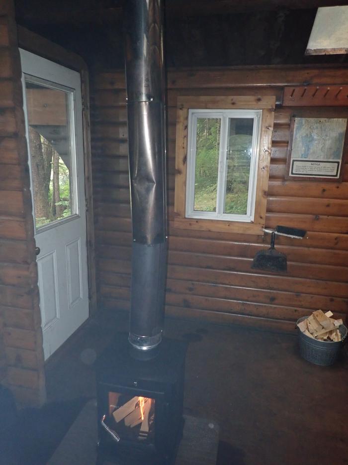 Entrance Area with StoveEntrance Area - oil stove has been replaced with wood stove