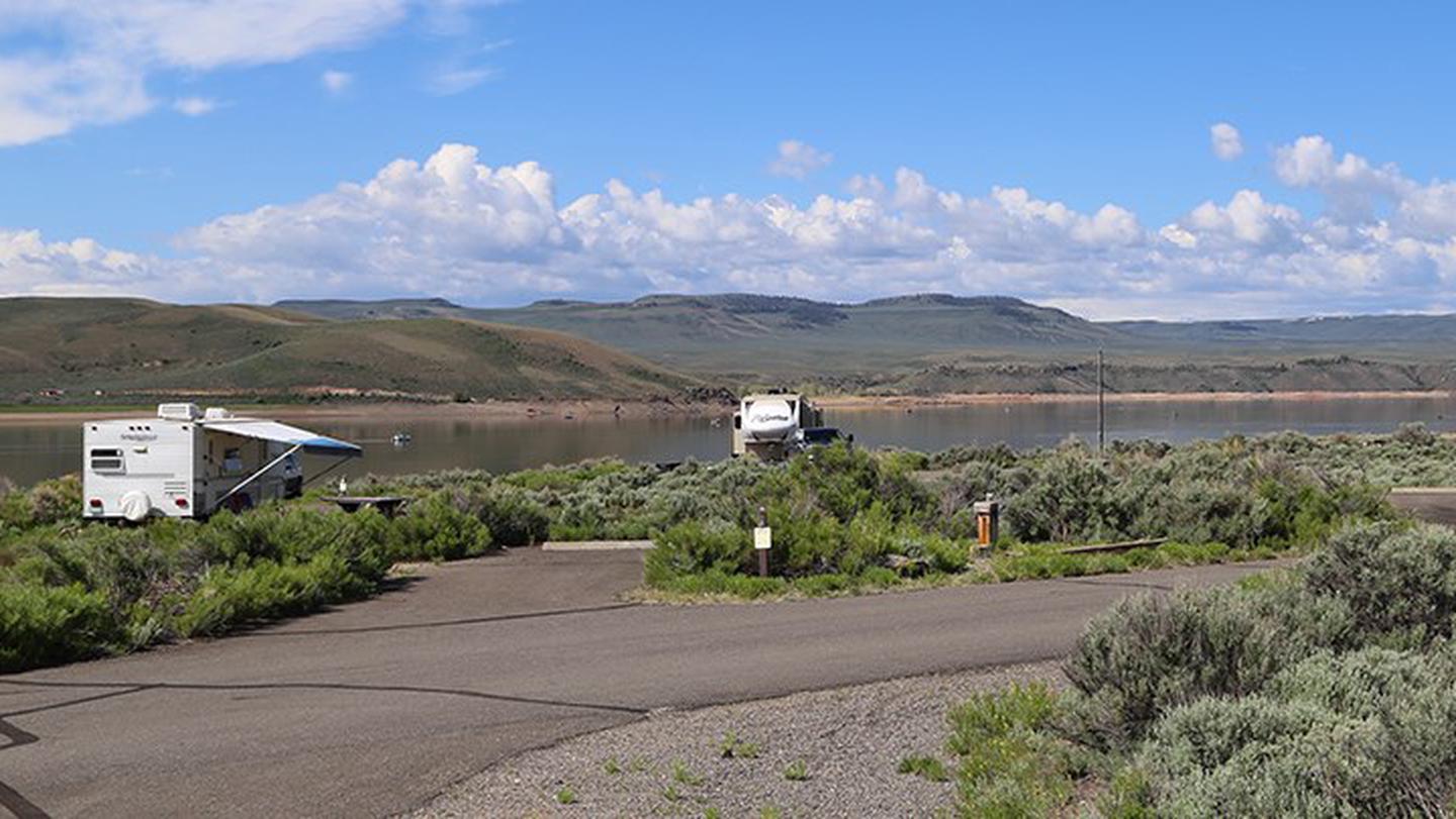 RV's at Stevens Creek Campground with a view of Blue Mesa Reservoir in the background