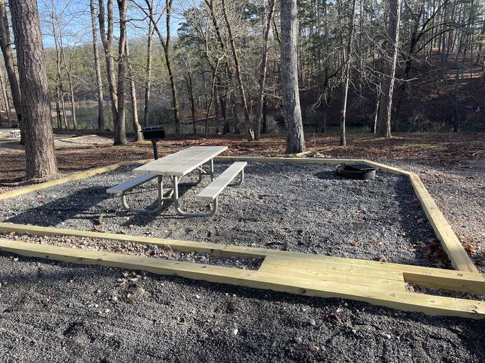 A photo of Site 03 of Loop A at Crystal Springs (AR) with Picnic Table, Fire Pit