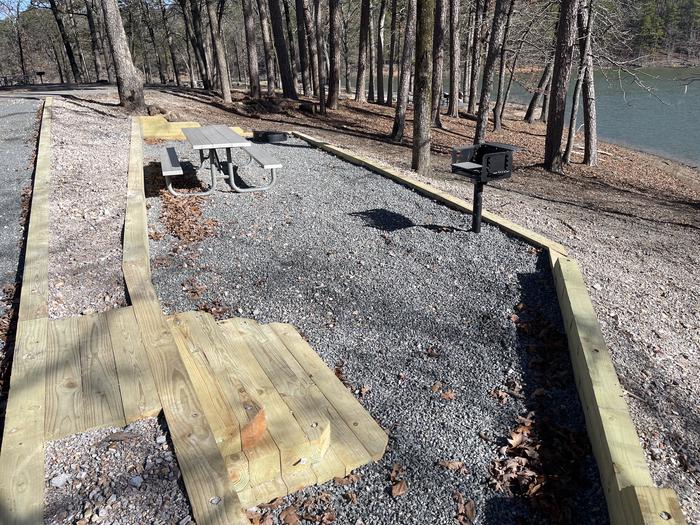 A photo of Site 11 of Loop A at Crystal Springs (AR) with Picnic Table, Fire Pit
