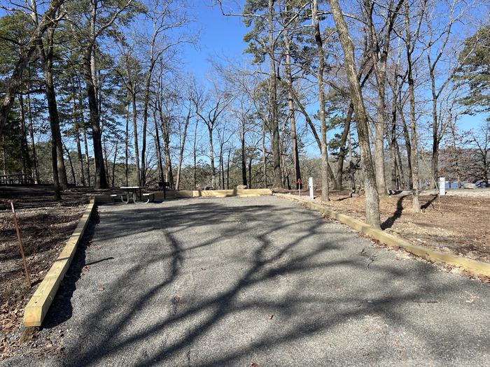 A photo of Site 14 of Loop A at Crystal Springs (AR) with Picnic Table, Electricity Hookup, Fire Pit, Water Hookup