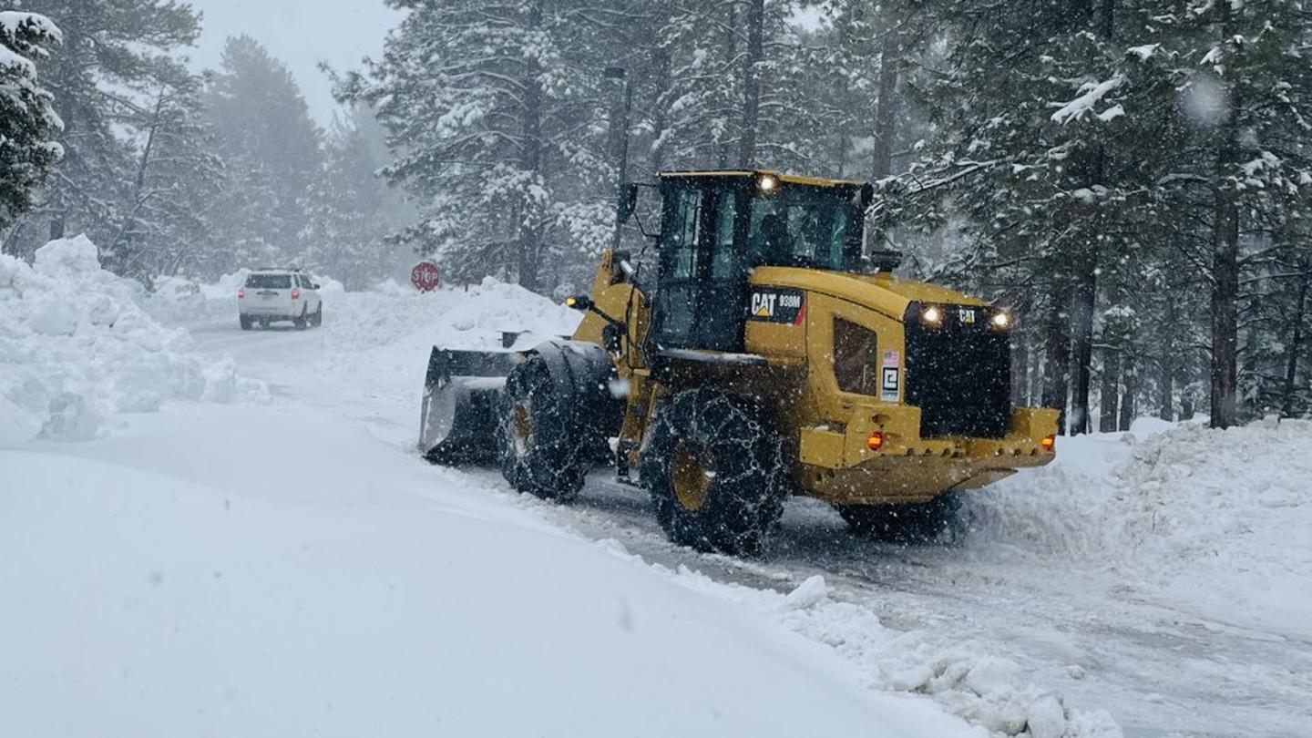 Opening day working hard to clear roads. Campsites snowy with 2 to 4 feet of snow.