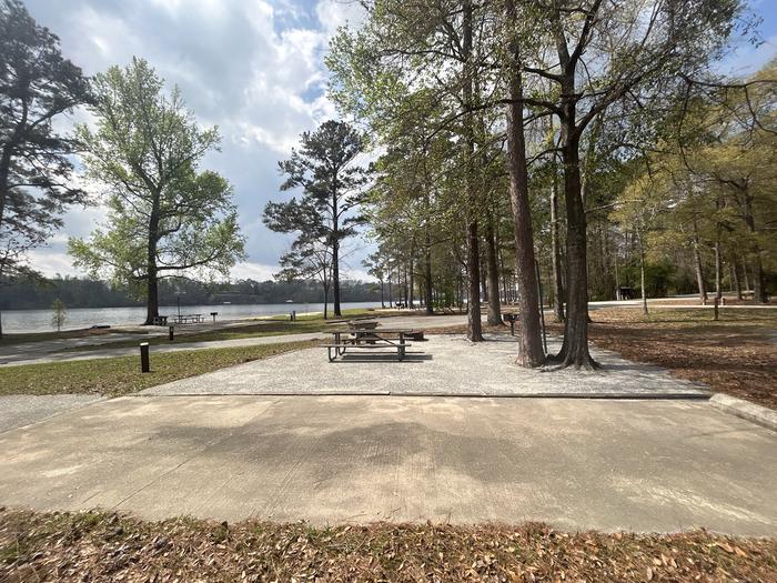 A photo of Site 089 of Loop CVIE at WHITE OAK (CREEK) CAMPGROUND with Picnic Table, Electricity Hookup, Fire Pit, Lantern Pole, Water Hookup