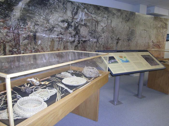 Picture of some of the exhibits at the Visitor Center.Exhibit about the rock art and ancient people who live in the region many years ago.