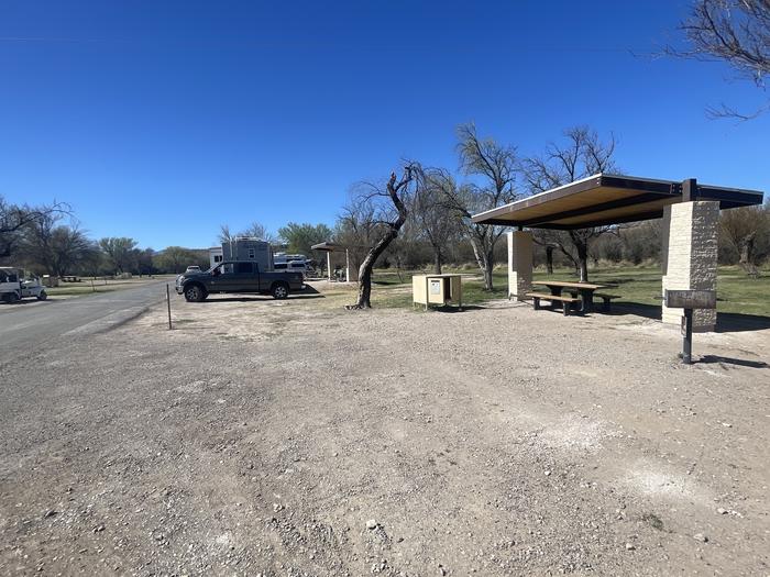 Site 56 with a shade structure, bear box, grill and picnic table